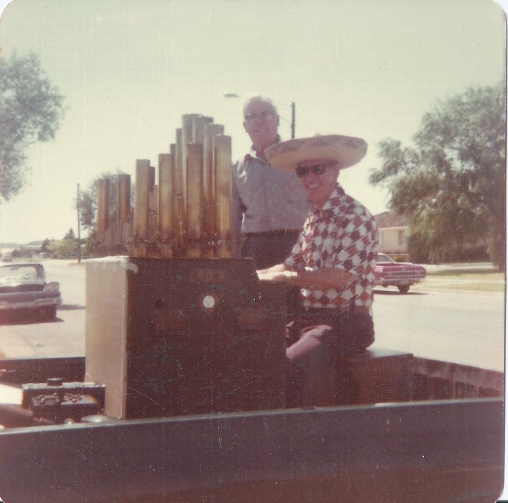 Dad playing organ at 4th of July parade